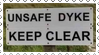 a stamp of a sign that says 'unsafe dyke keep clear'